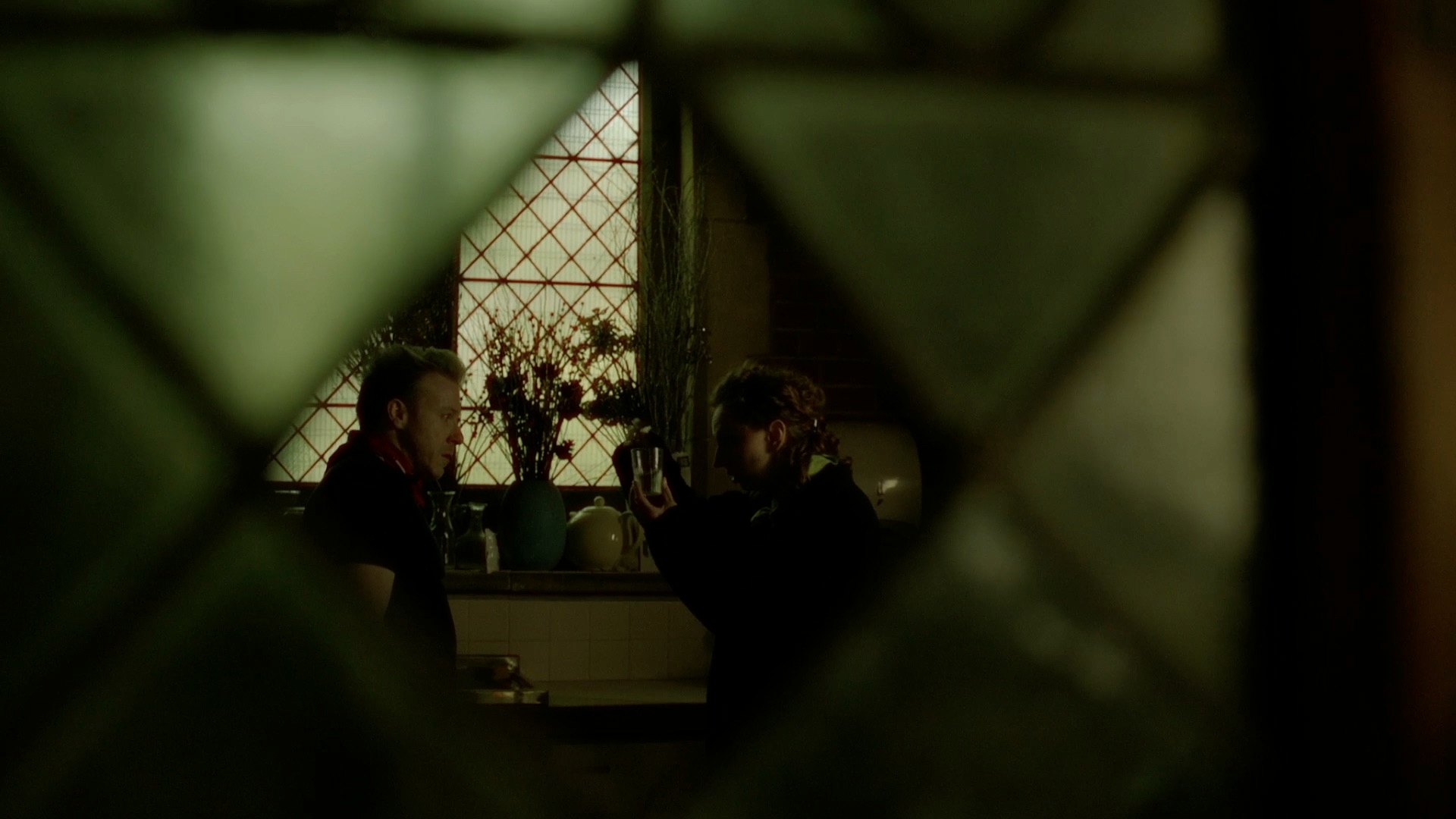 Cult Break — diamond pane, two figures at window